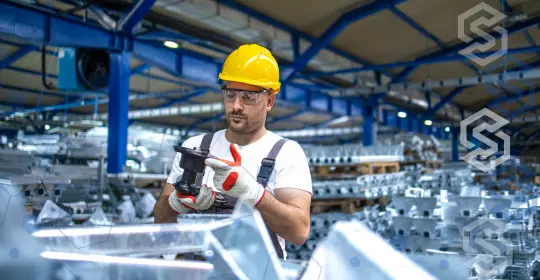 Production Worker Inspecting Product